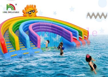 Anti - UV Inflatable Water Parks Triple Lanes PVC Rainbow Slide With Swimming Pool For Rentals