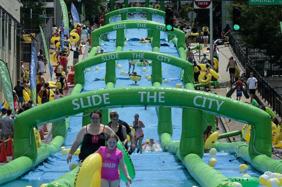 Customized 100m Long Outdoor Inflatable Water Sports Game City Slide For Adults