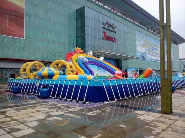 Large Frame Pool / Rainbow Slide Amazing Inflatable Water Park For Entertainment