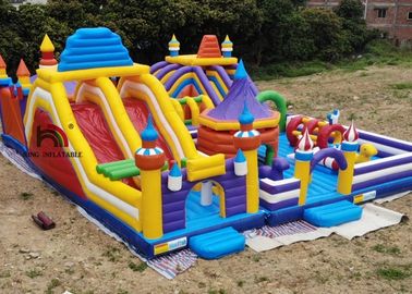 Outdoor 20mL Yellow Rocket Inflatable Amusement Park For Kids Use Logo Printing